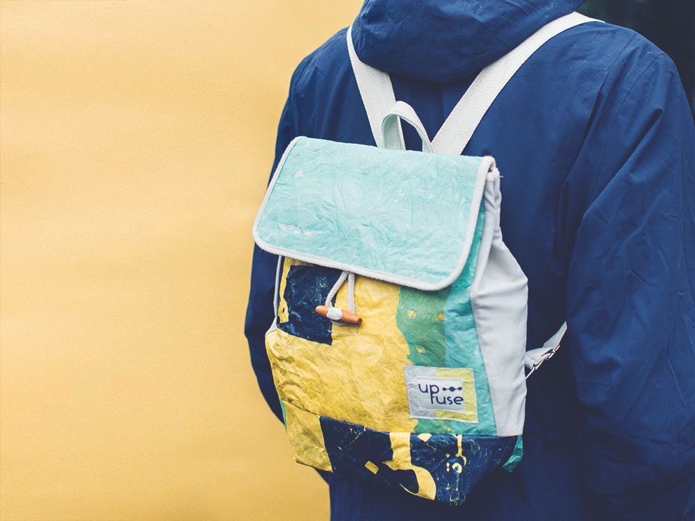 Up-fuse backpacks are upcycled from rejected plastic bags.