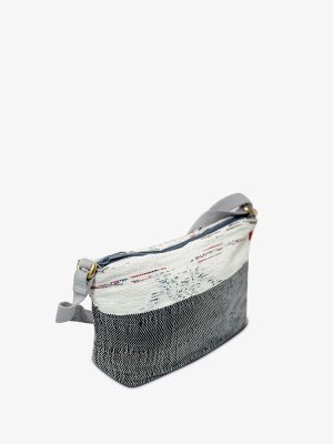 A compact crossbody bag that’s so spacious it could fit a kangaroo. Easily holds everything you need in a day (e.g. water bottle, small towels, phone, wallet, energy bars)