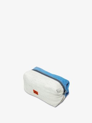 The quintessential utility pouch. Stuffs like a potato. Sits like a couch. With room for toiletries, accessories and pretty much anything you think of.